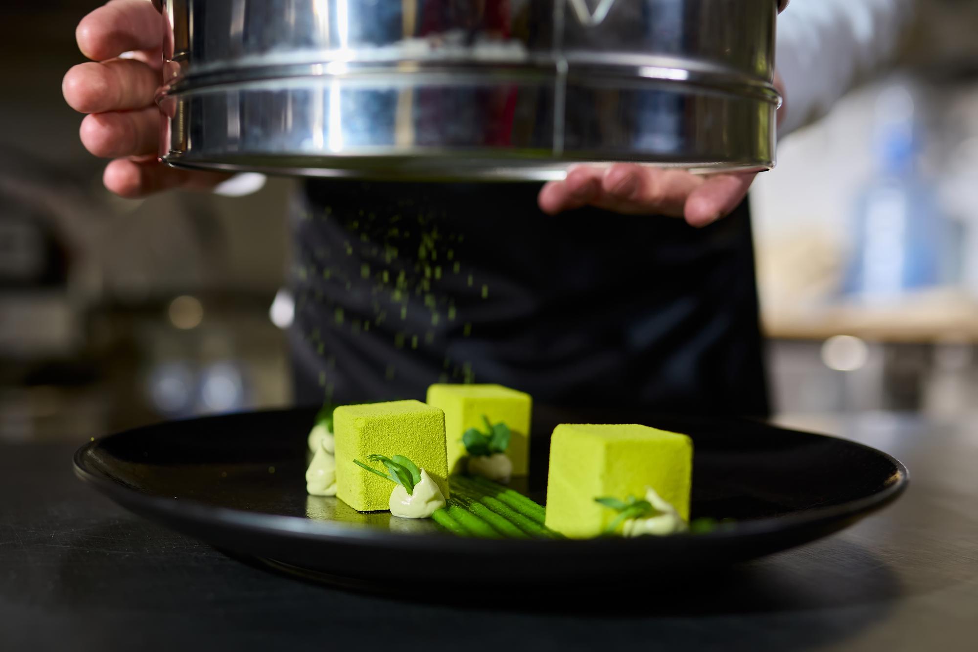 small commercial kitchen with plated dishes